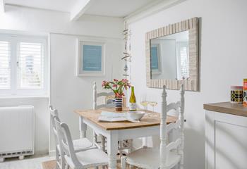 The nautical theme continues into the kitchen which has plenty of space to dine, and is exceptionally well equipped.