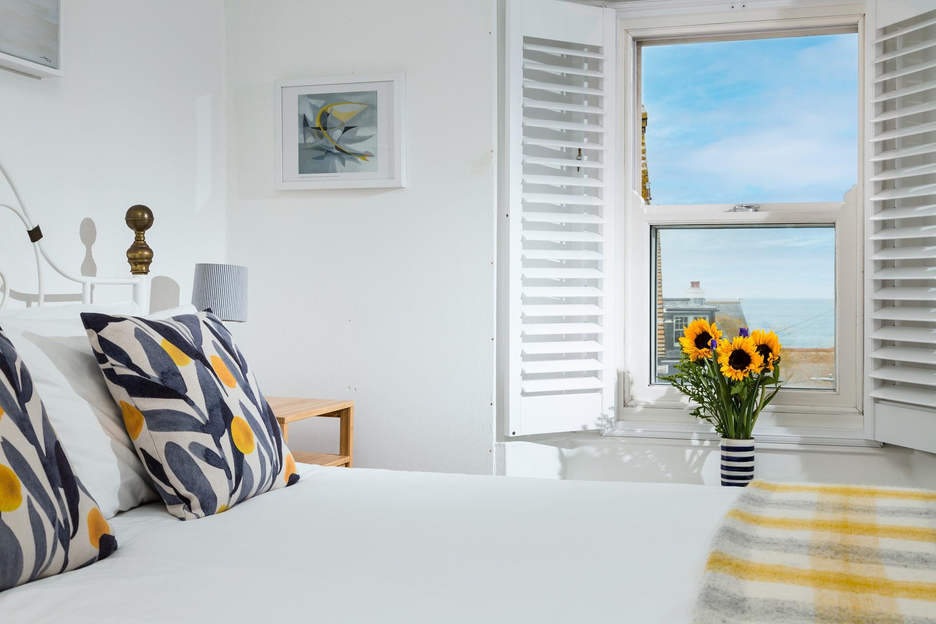 The fun colours really capture the magic of a seaside holiday!