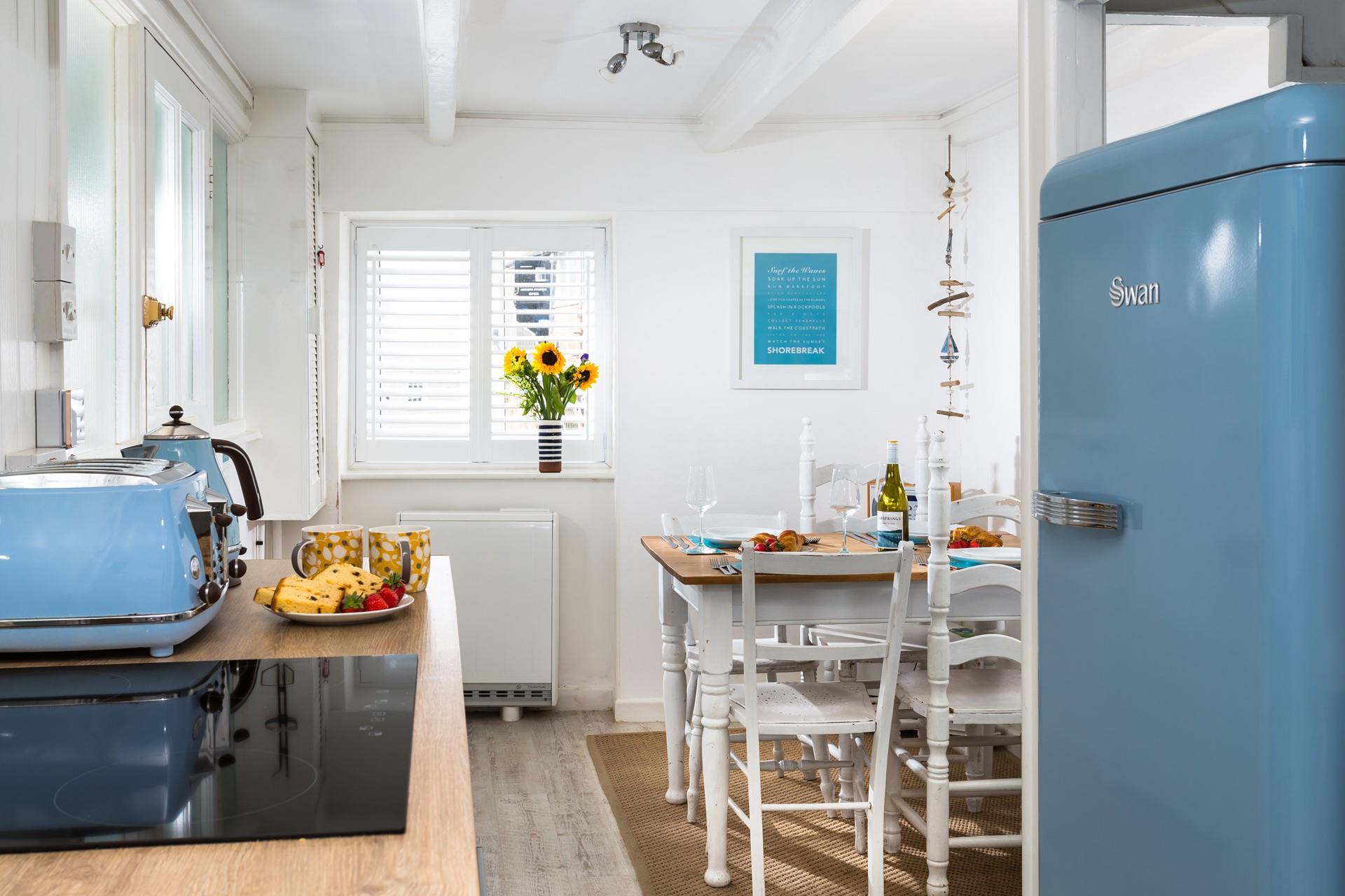 The kitchen and ground floor benefit from underfloor heating keeping it warm and toasty at any time of year. 