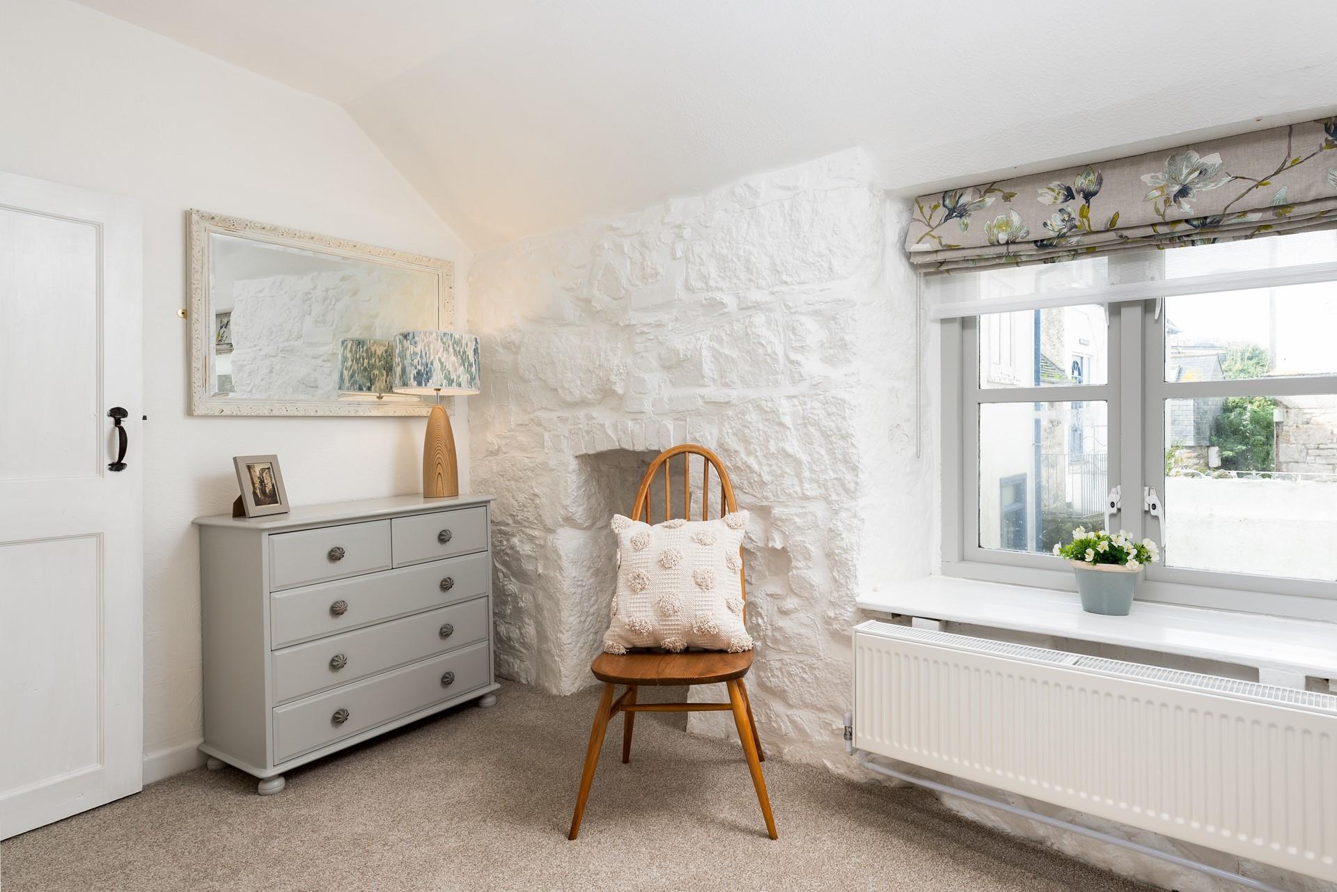 Wake early, pour yourself a generous mug of your favourite hot drink and watch St Ives slowly wake up from this window spot.