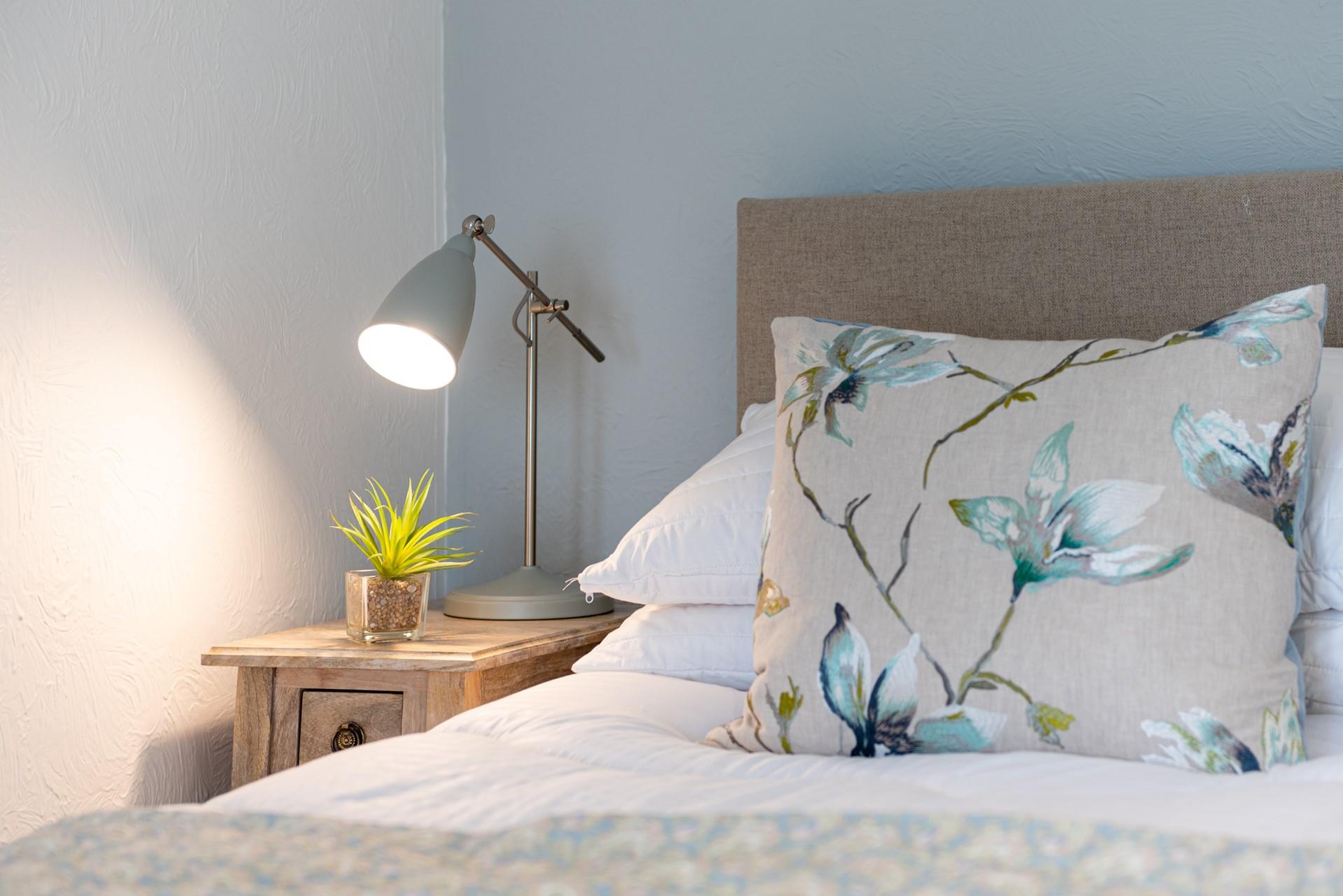 Convenient table lamps allow you to indulge in a spot of bedtime reading before settling down for the night.