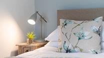 Convenient table lamps allow you to indulge in a spot of bedtime reading before settling down for the night.