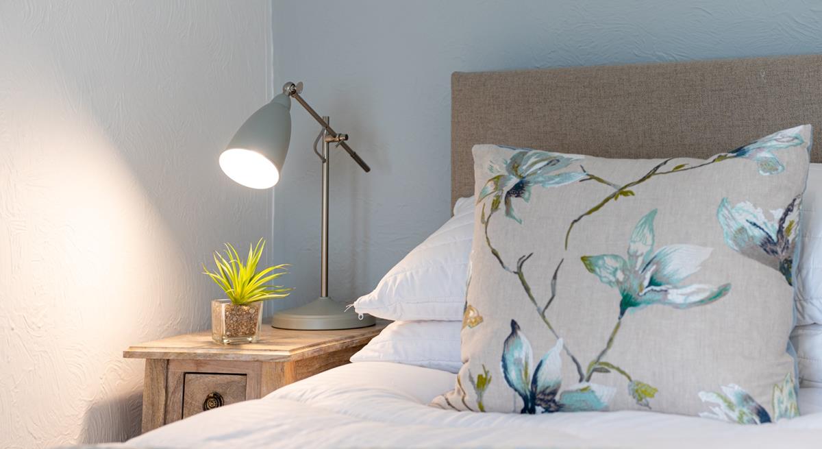 Convenient table lamps allow you to indulge in a spot of bedtime reading before settling down for the night.