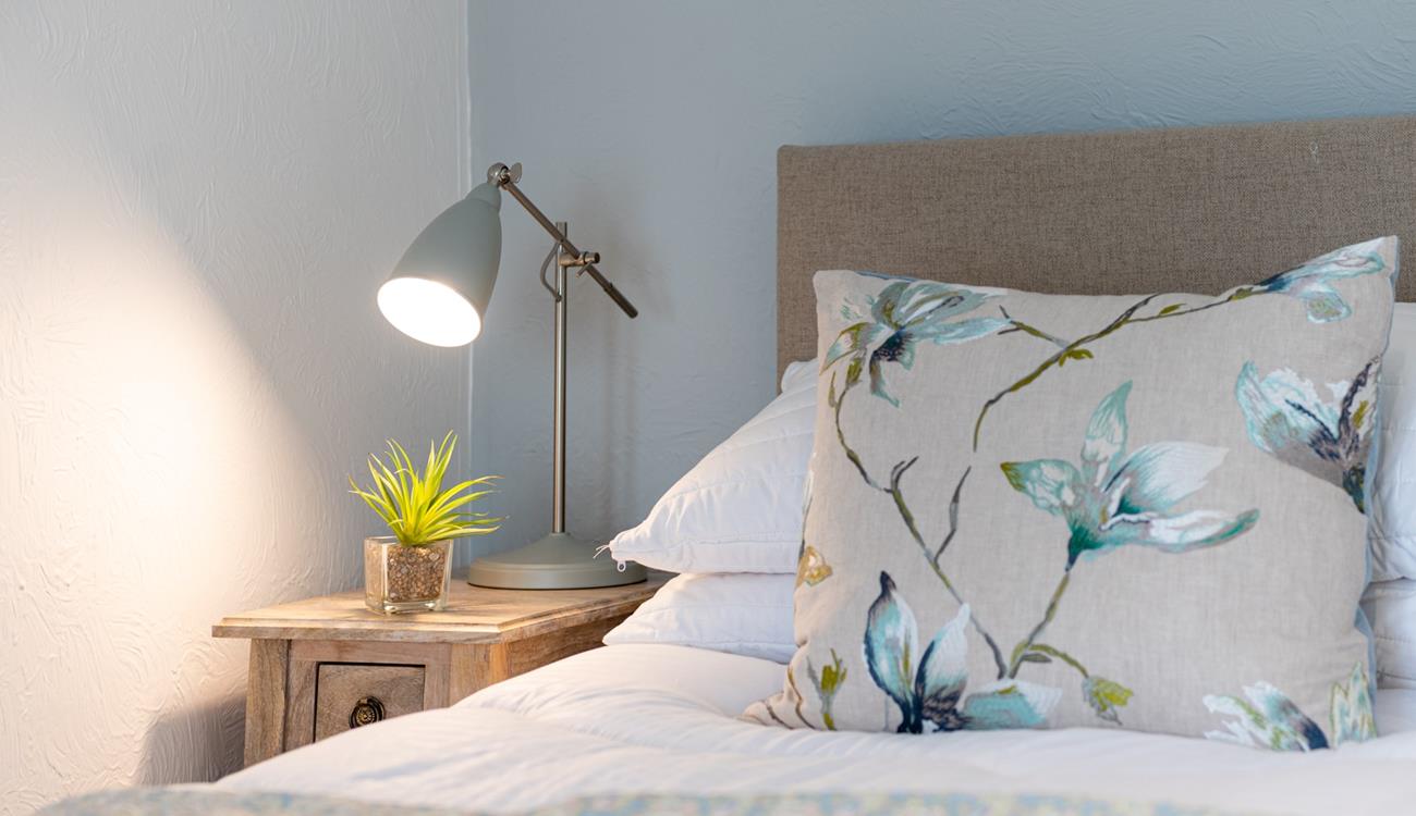 Convenient table lamps allow you to indulge in a spot of bedtime reading before settling down for the night.