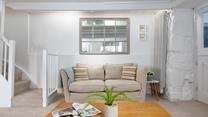 Soft cream, sand, and nude shades are reminiscent of a day at the beach, giving the property a subtle nautical feel.