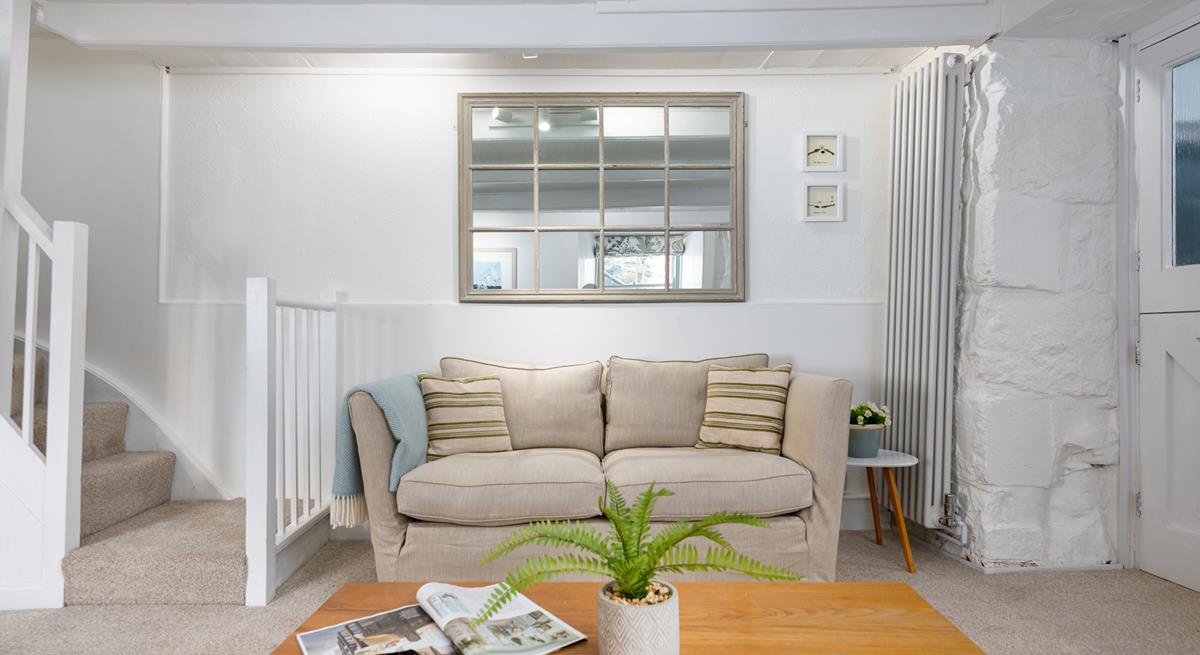 Soft cream, sand, and nude shades are reminiscent of a day at the beach, giving the property a subtle nautical feel.