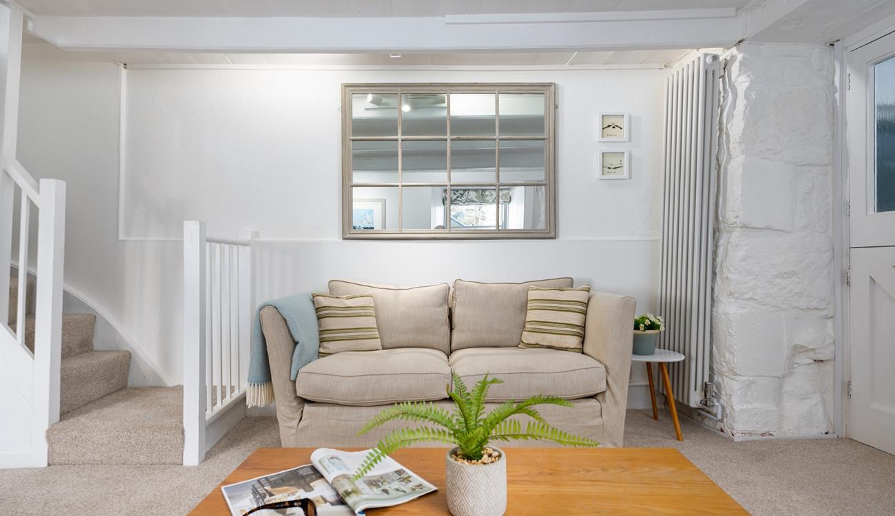 Soft cream, sand, and nude shades are reminiscent of a day at the beach, giving the property a subtle nautical feel.