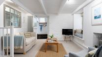 Stone walls and exposed beams add character to this gorgeous bolthole.