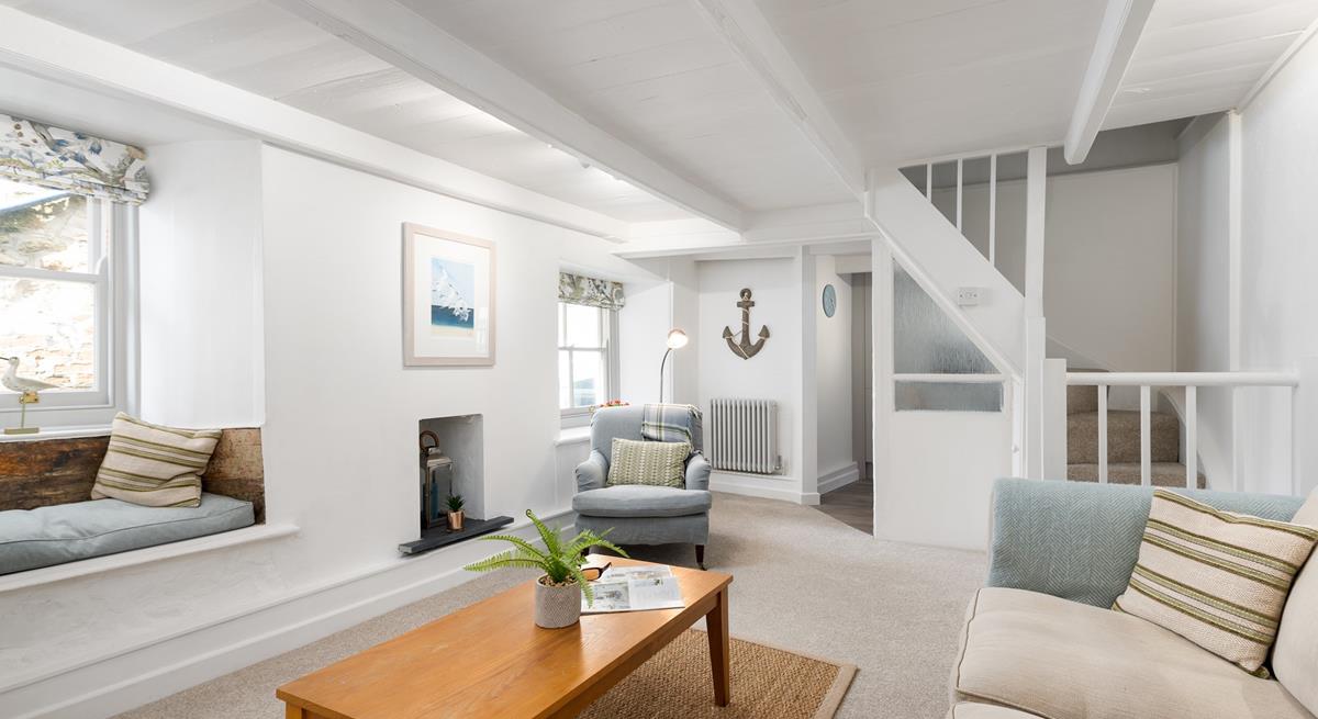 Decorated in soothing neutral tones, the lounge offers a blissful space to unwind and relax together.