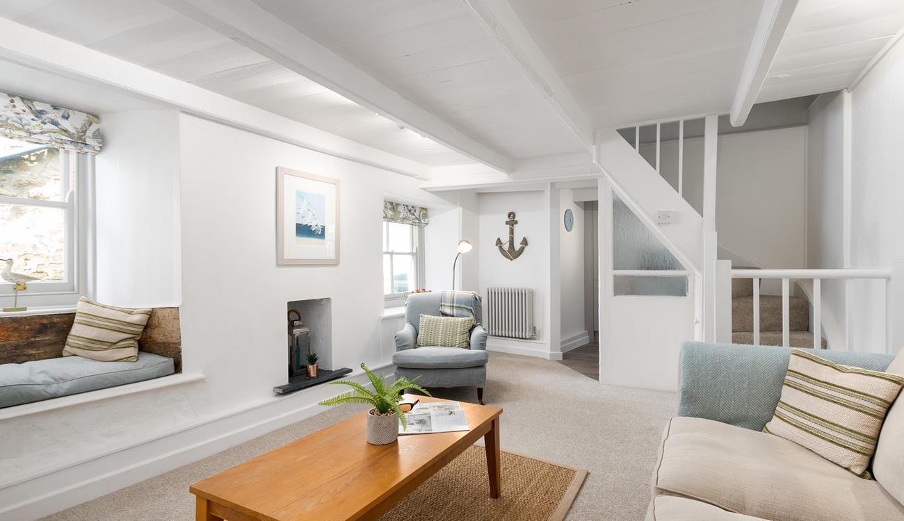 Decorated in soothing neutral tones, the lounge offers a blissful space to unwind and relax together.