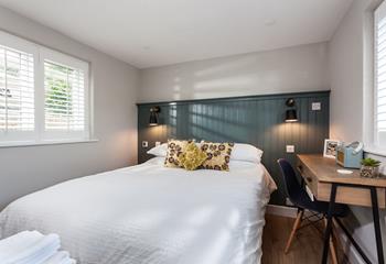 The bedroom provides you with a cosy sanctuary to rest your head at night.