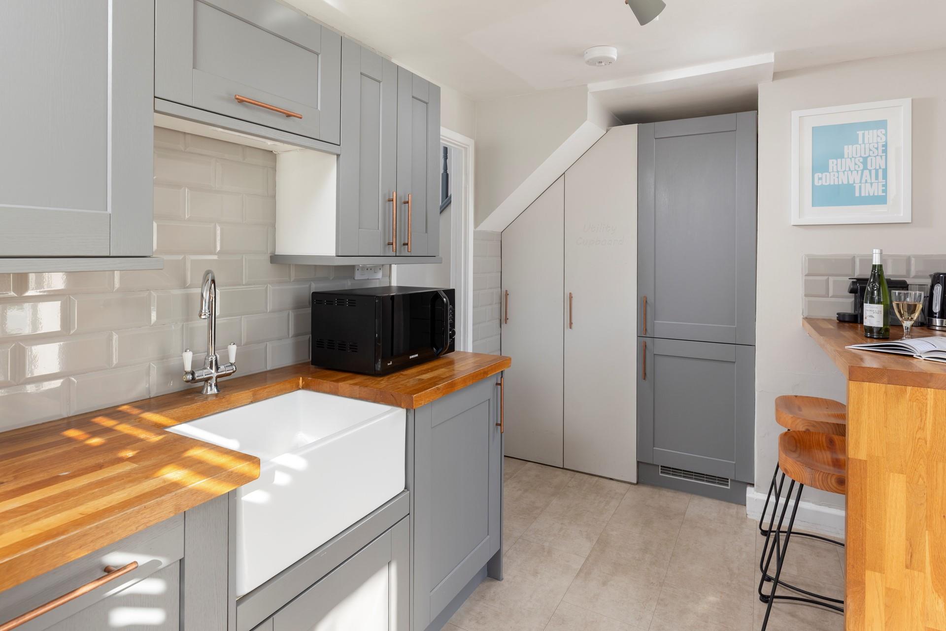 The kitchen is well-equipped for all your cooking needs.