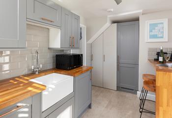 The kitchen is well-equipped for all your cooking needs.