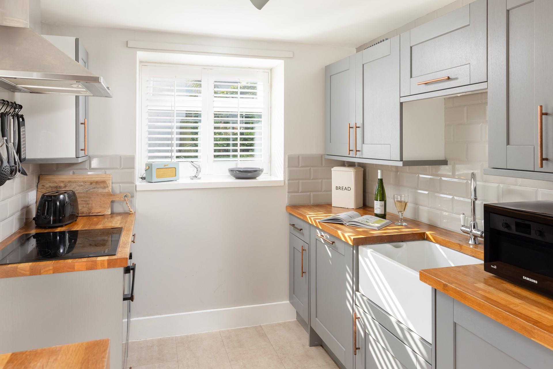 The modern kitchen is perfect for cooking up a storm for the family.