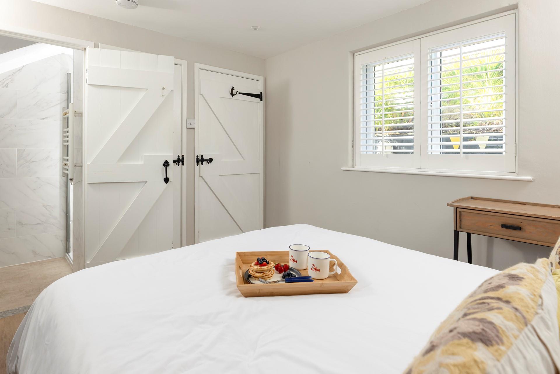 The bedroom provides you with a cosy sanctuary to rest your head at night.