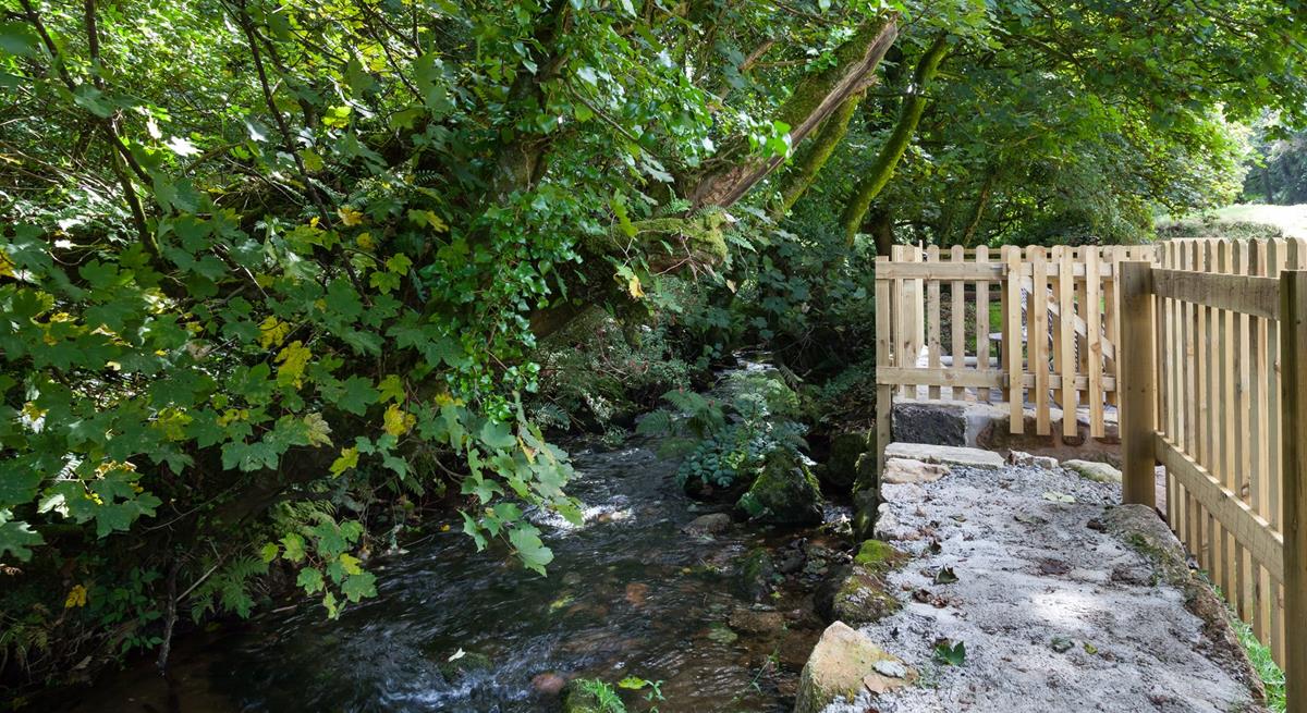 There is a lovely stream at the bottom of the garden for dipping toes on summer days.