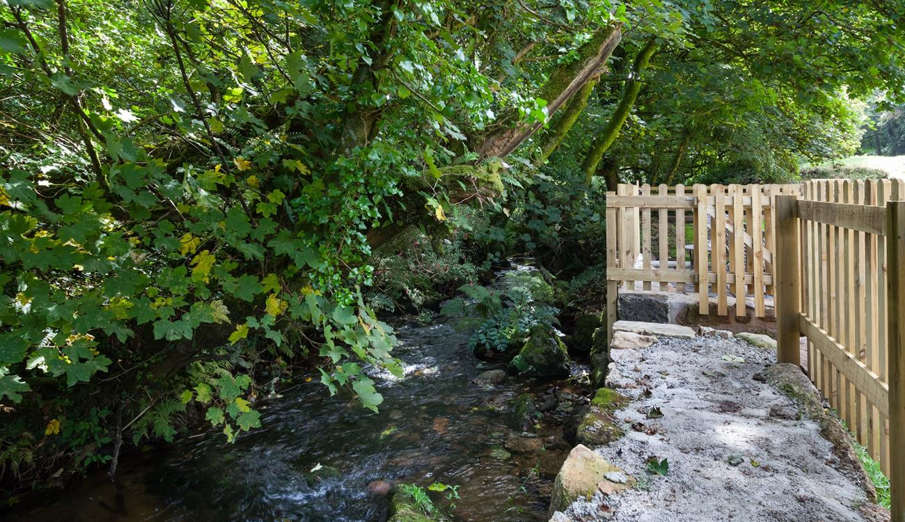 There is a lovely stream at the bottom of the garden for dipping toes on summer days.