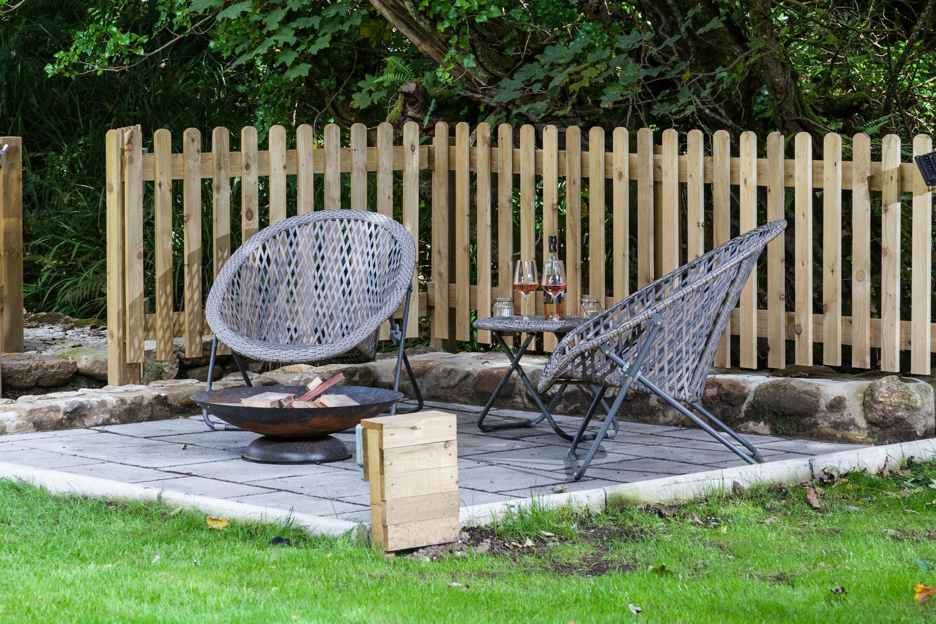 When you've put the little ones to bed, head outside to sit around the fire pit as the sun goes down.