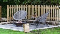 When you've put the little ones to bed, head outside to sit around the fire pit as the sun goes down.