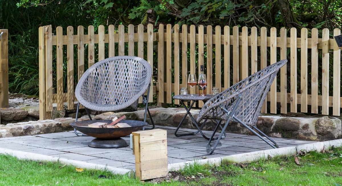 When you've put the little ones to bed, head outside to sit around the fire pit as the sun goes down.