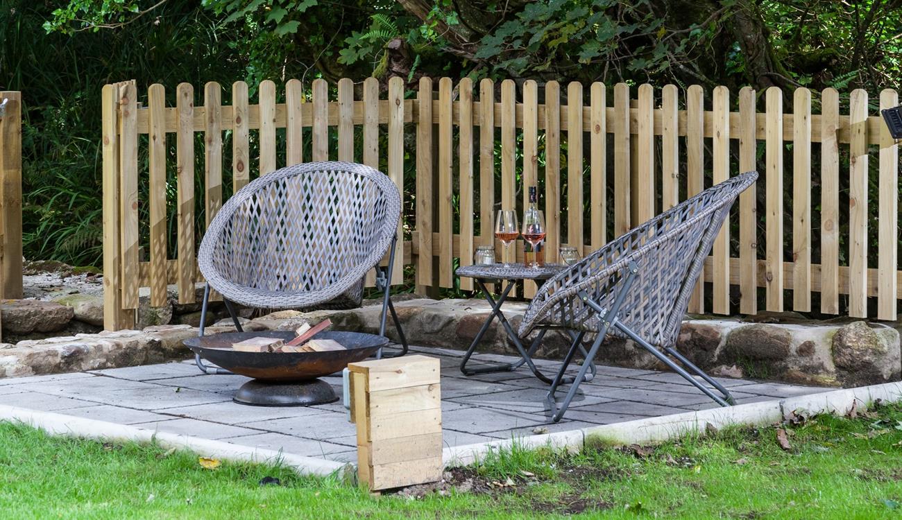 When you've put the little ones to bed, head outside to sit around the fire pit as the sun goes down.