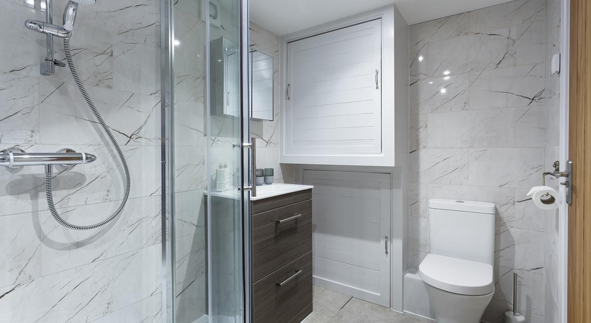 The sleek bathroom is the perfect space to get ready each day.