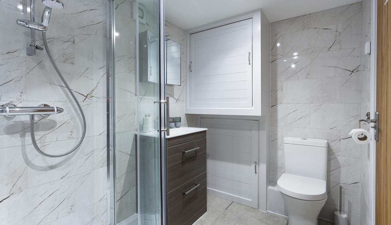 The sleek bathroom is the perfect space to get ready each day.
