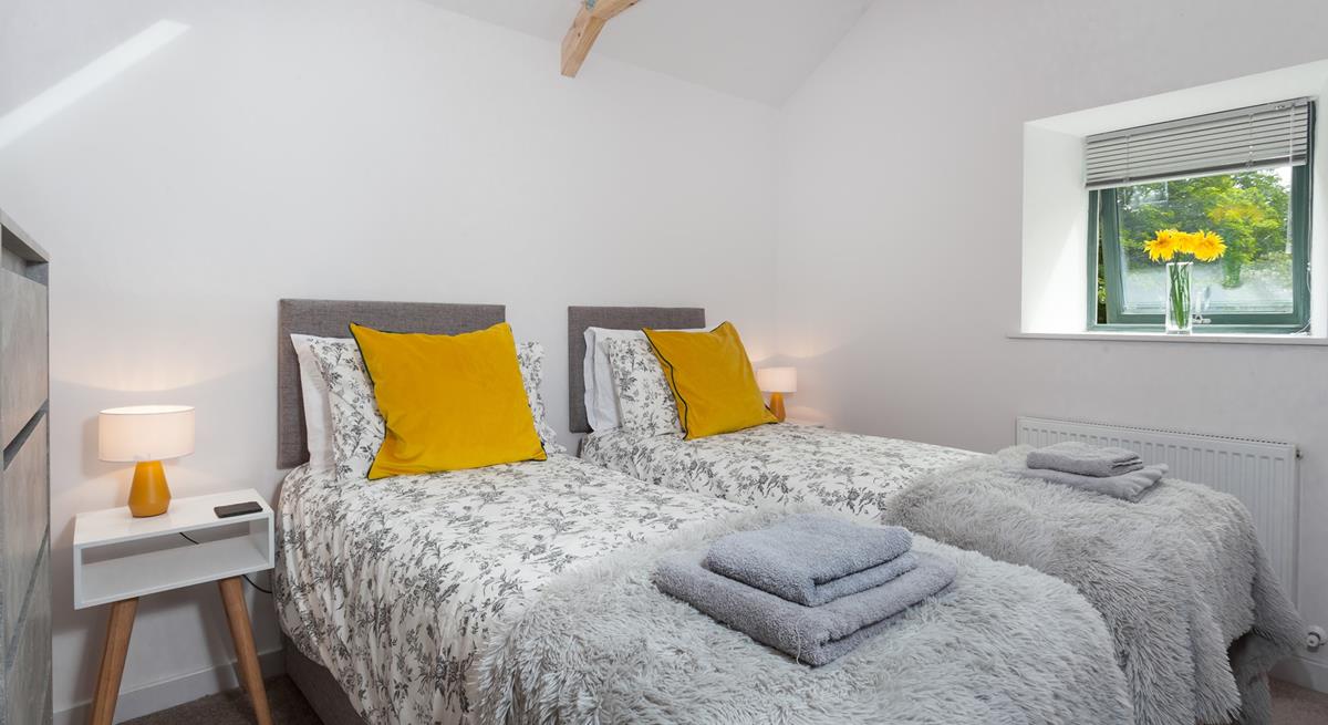 Bedroom 2 has zip and link beds allowing for flexible sleeping arrangements.