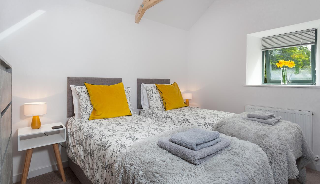 Bedroom 2 has zip and link beds allowing for flexible sleeping arrangements.