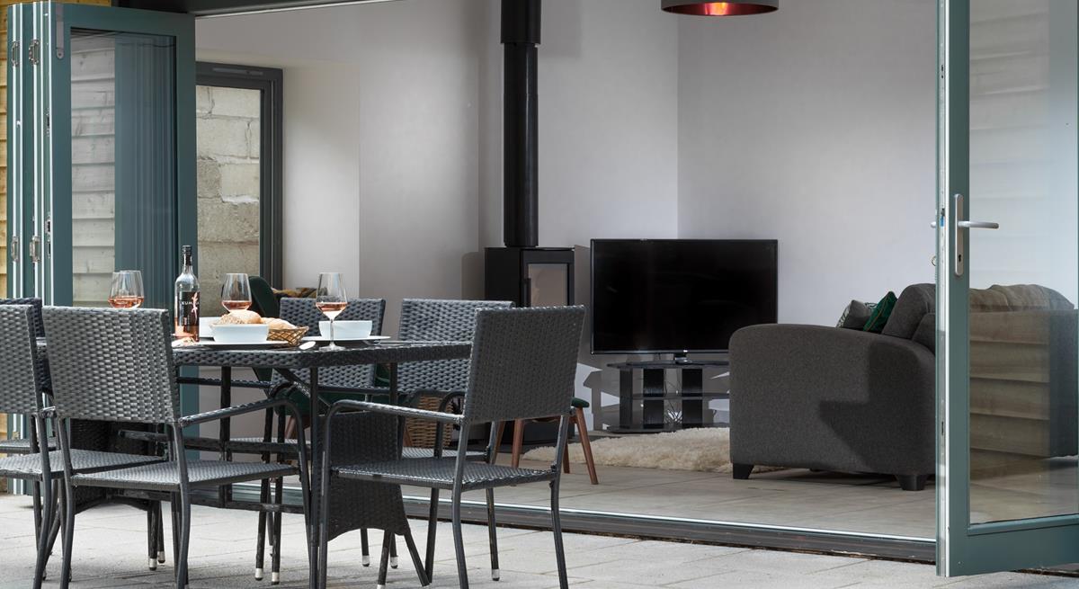 Open the bi-fold doors and take your evening meal outside on a summer's evening.