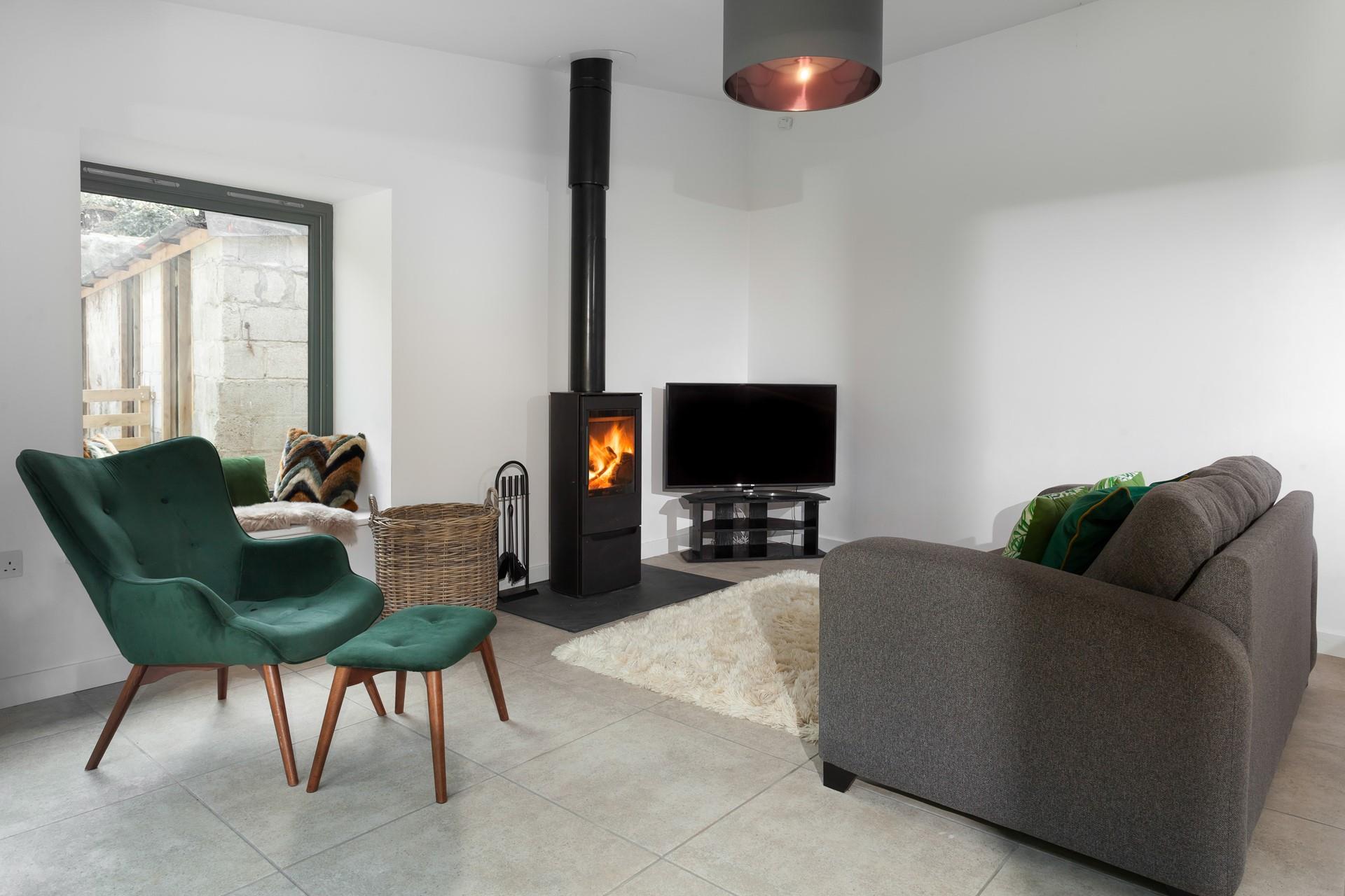 Listen to the crackling of the woodburner whilst you relax in the cosy sitting room.