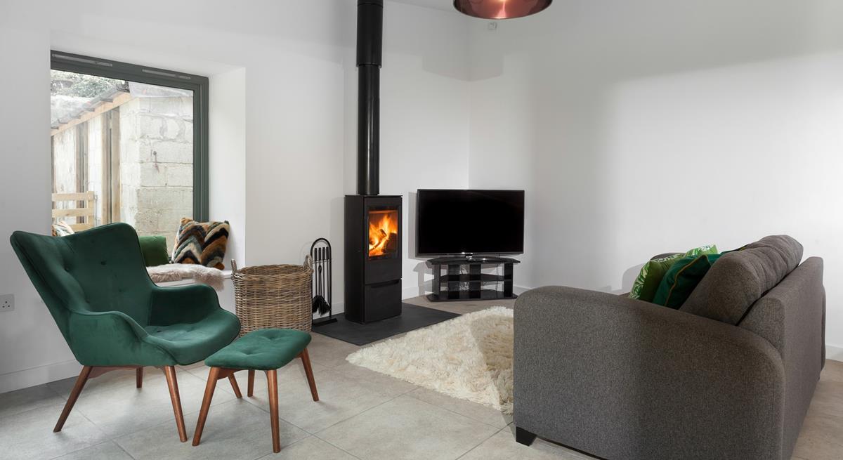 Listen to the crackling of the woodburner whilst you relax in the cosy sitting room.