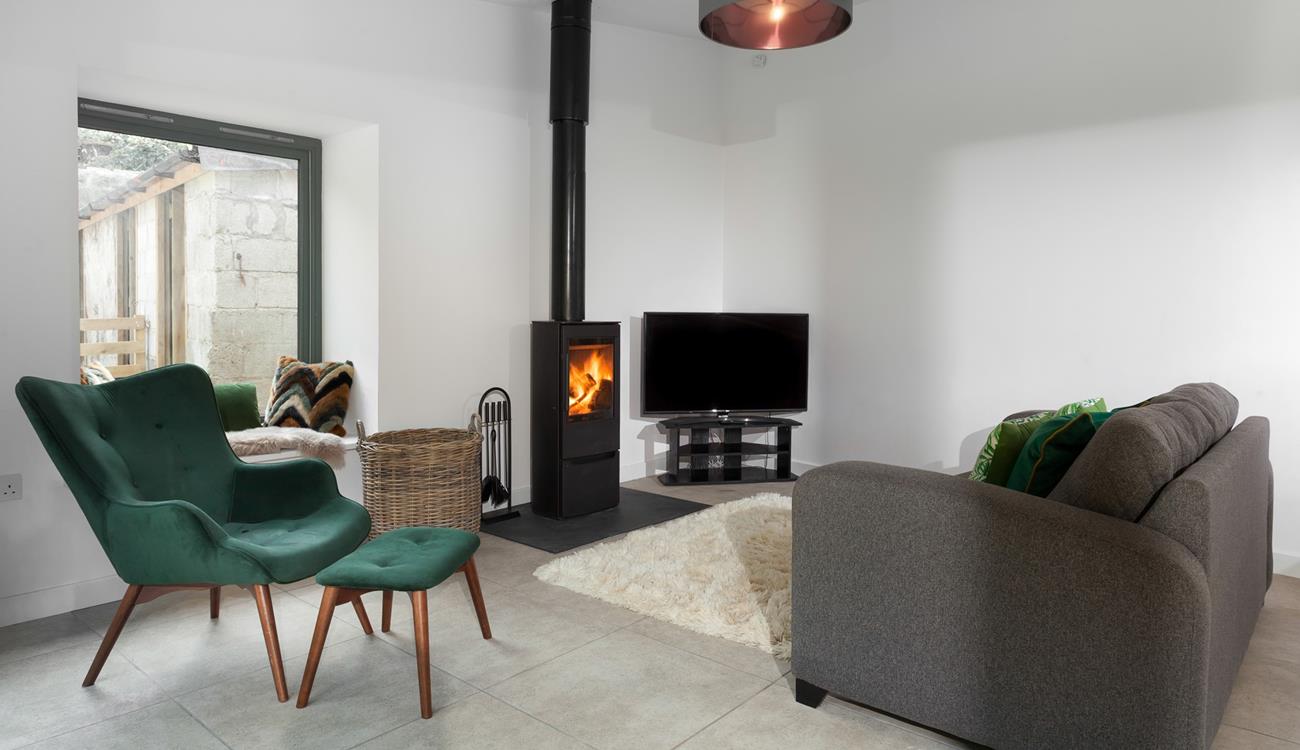 Listen to the crackling of the woodburner whilst you relax in the cosy sitting room.