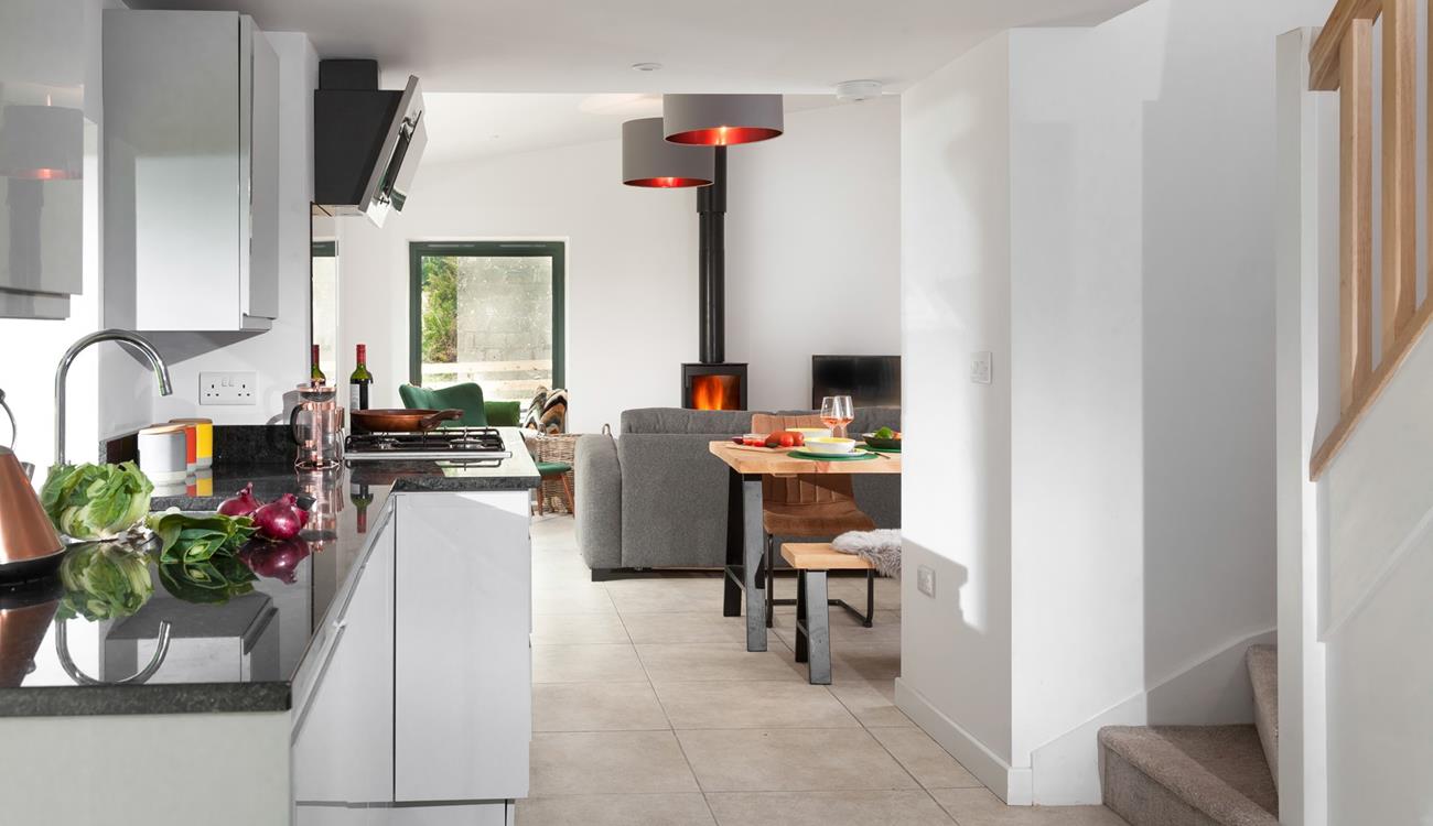 The kitchen is modern and well-equipped for cooking up a storm.