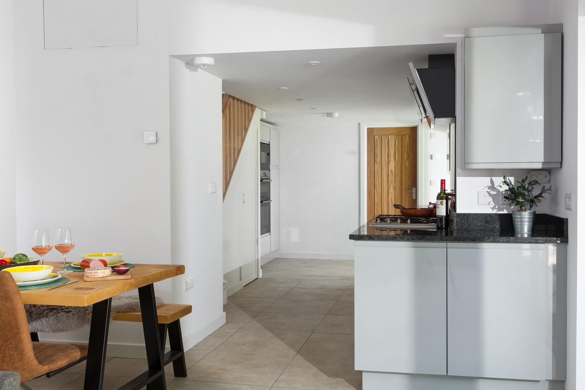 Wake up and wander down to the kitchen to make a coffee to start the day.