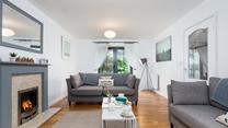 Settle on the sofa for a night in front of the fire after an evening stroll around the harbour in Charlestown.