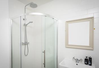 Start your morning with an invigorating shower in the modern bathroom.