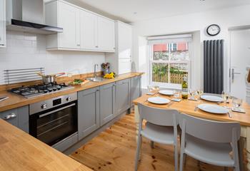 The kitchen is fabulously bright, spacious and modern, perfect for cooking family meals!