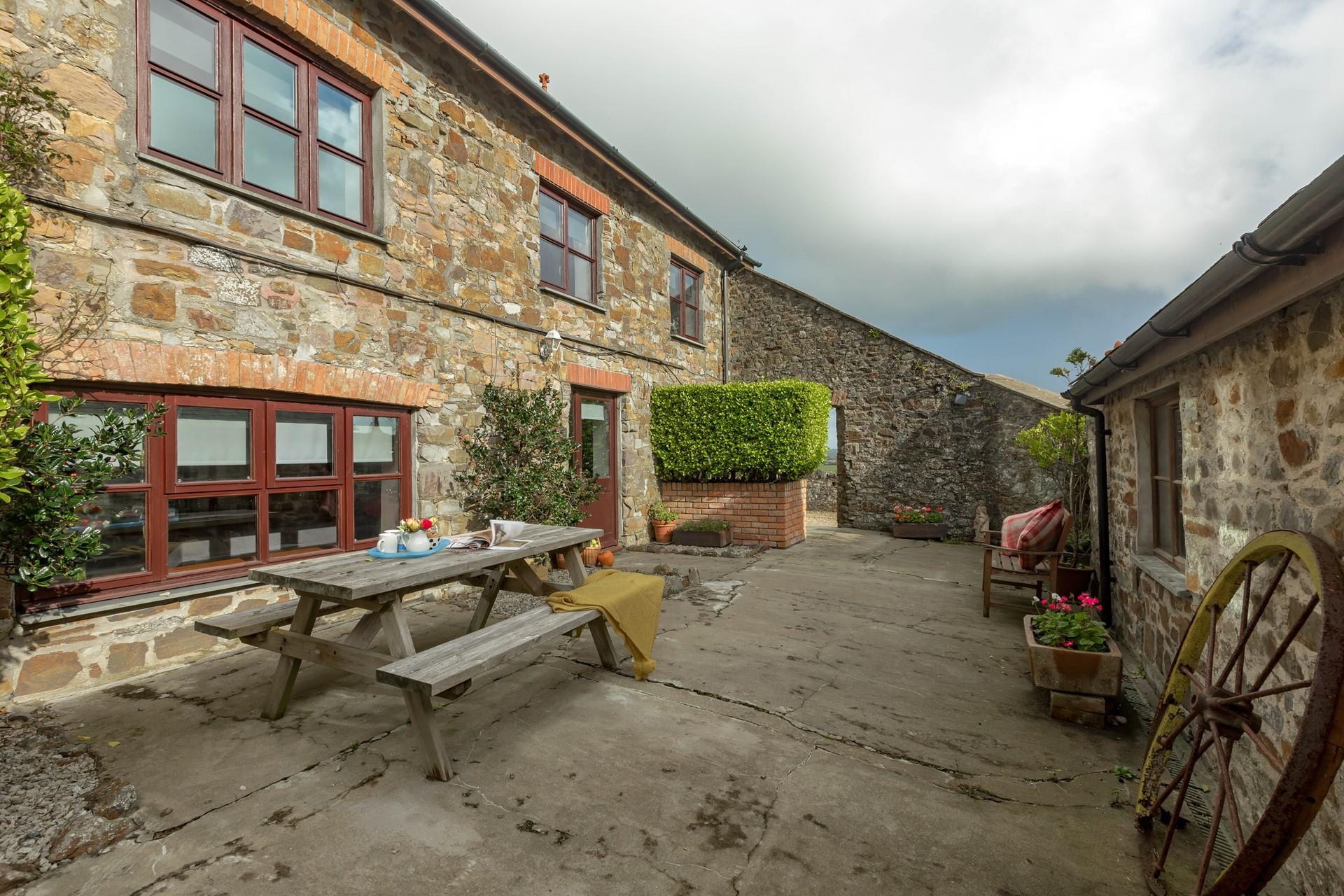 The rose garden courtyard is sheltered and is a lovely suntrap, perfect for tucking into afternoon tea and cake.