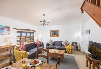 The light and airy sitting room is the perfect spot to unwind after a day spent on Widemouth Bay.