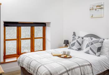 Bedroom 1 has a sumptuous double bed, perfect for sipping your morning cuppa.