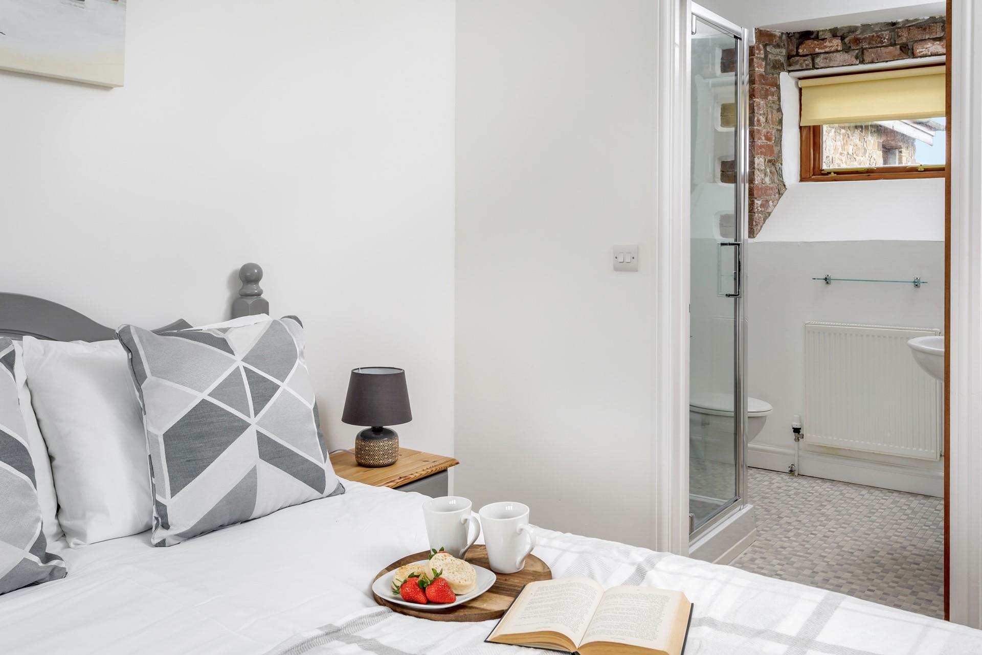 Wake up and wander into your en suite to get ready for the day.