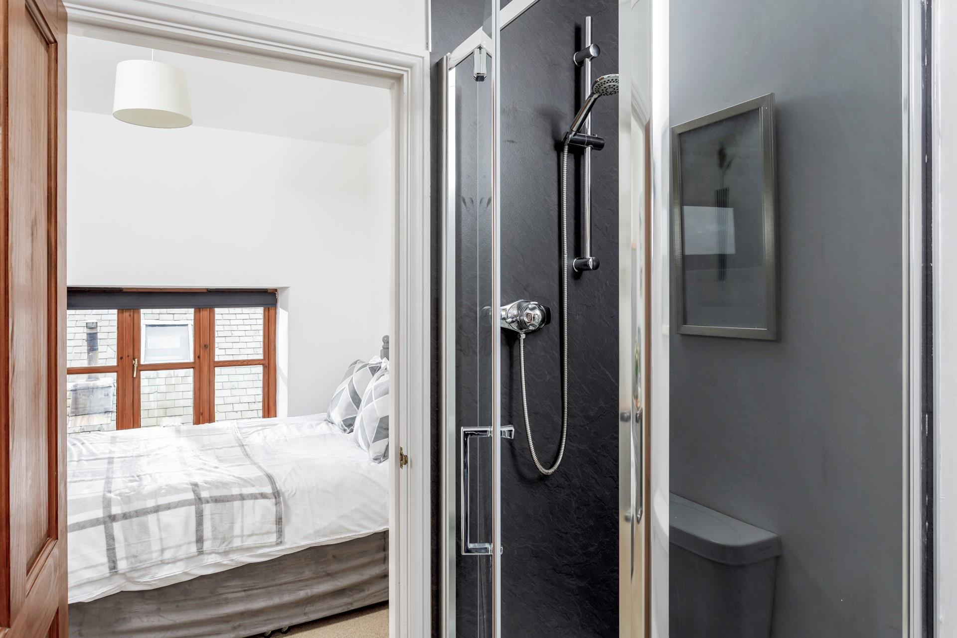 Wash off your sandy toes in the shower and spend a cosy night in the sitting room.