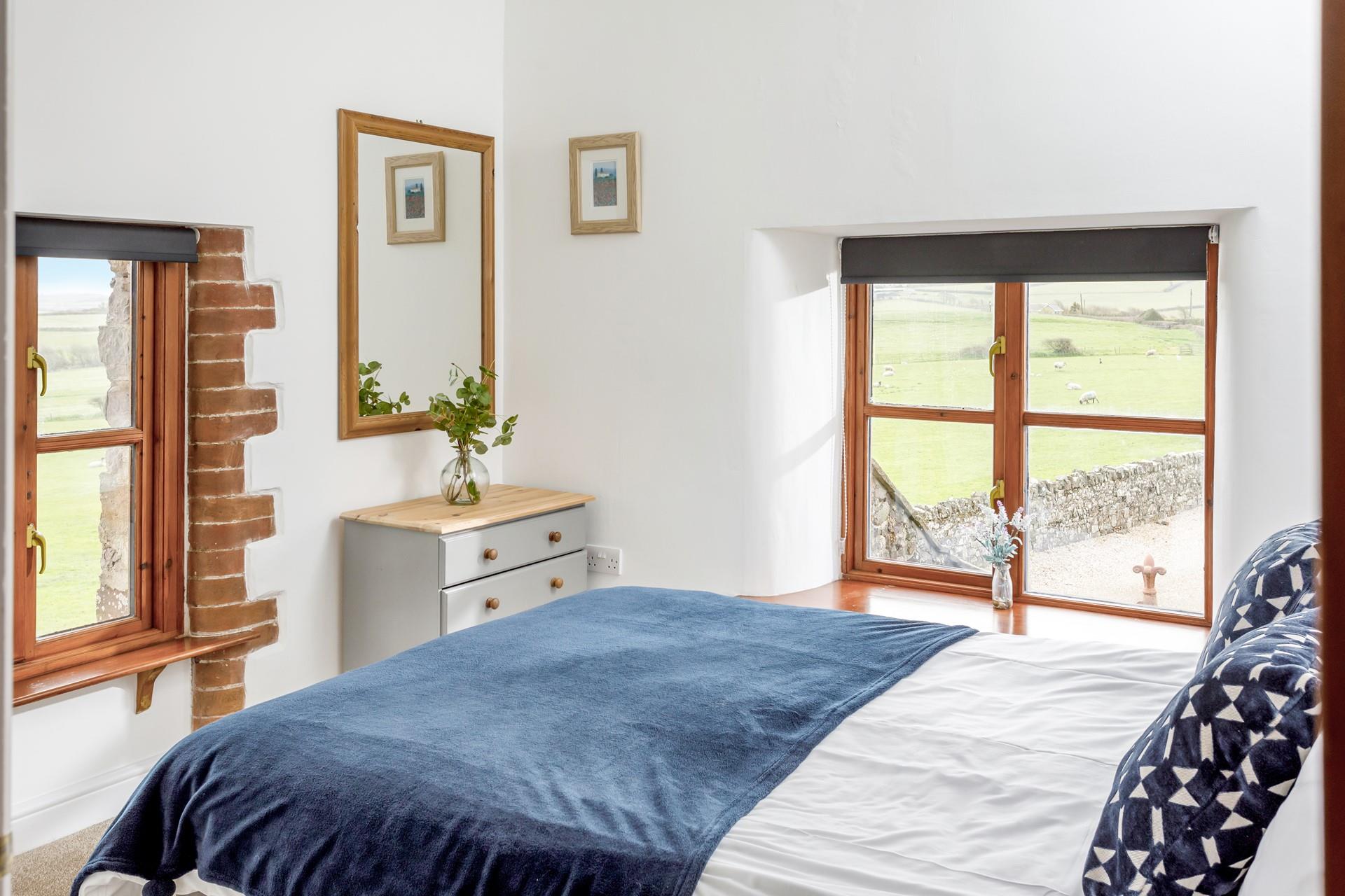 Bedroom 3 has stunning views over the surrounding fields to wake up to each morning.