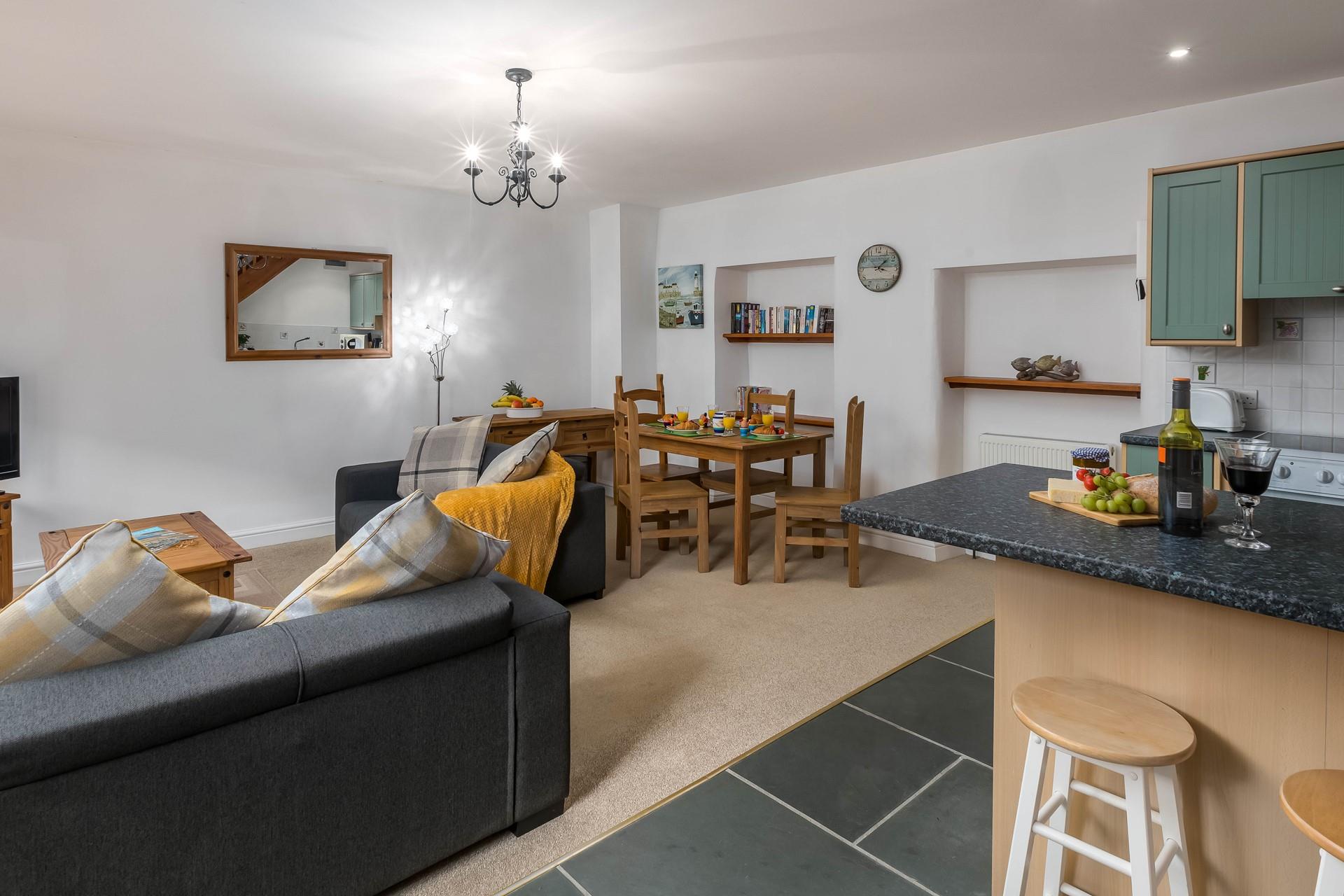 Make use of the cleverly designed breakfast bar area to relax with a glass of wine after a long day exploring the beautiful Cornish coastline.