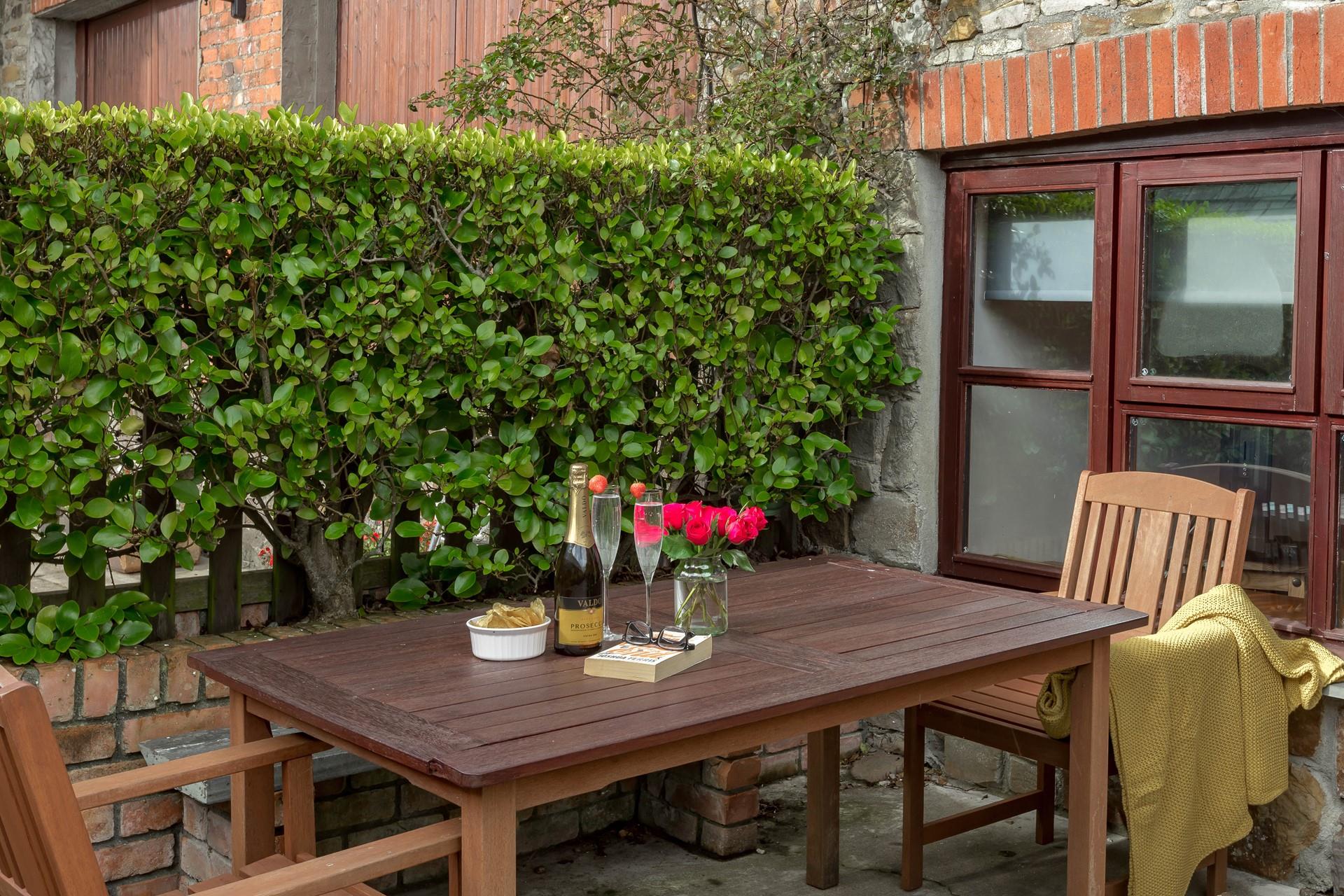 Take prosecco and nibbles outside to soak up the late afternoon sun.