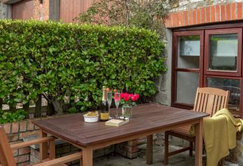 Take prosecco and nibbles outside to soak up the late afternoon sun.