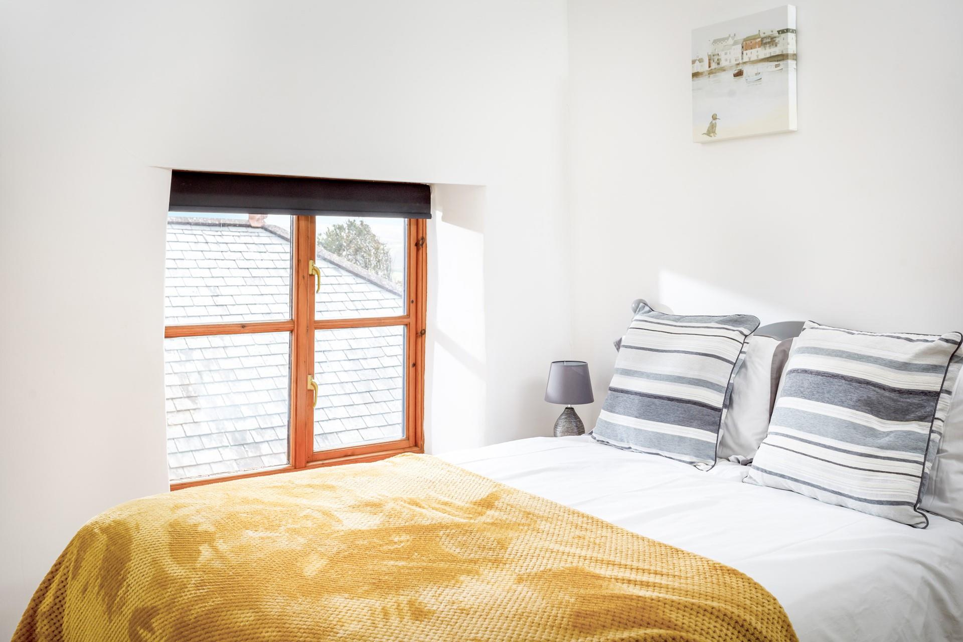 Bedroom 1 has a comfortable double bed for tucking into after memorable days exploring Cornwall.