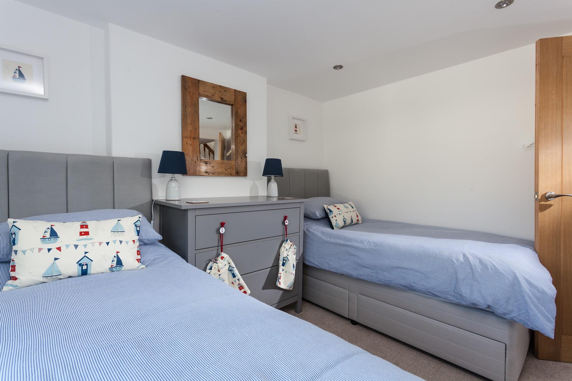 The twin room has a nautical theme and offers a restful night's sleep for children or adults.