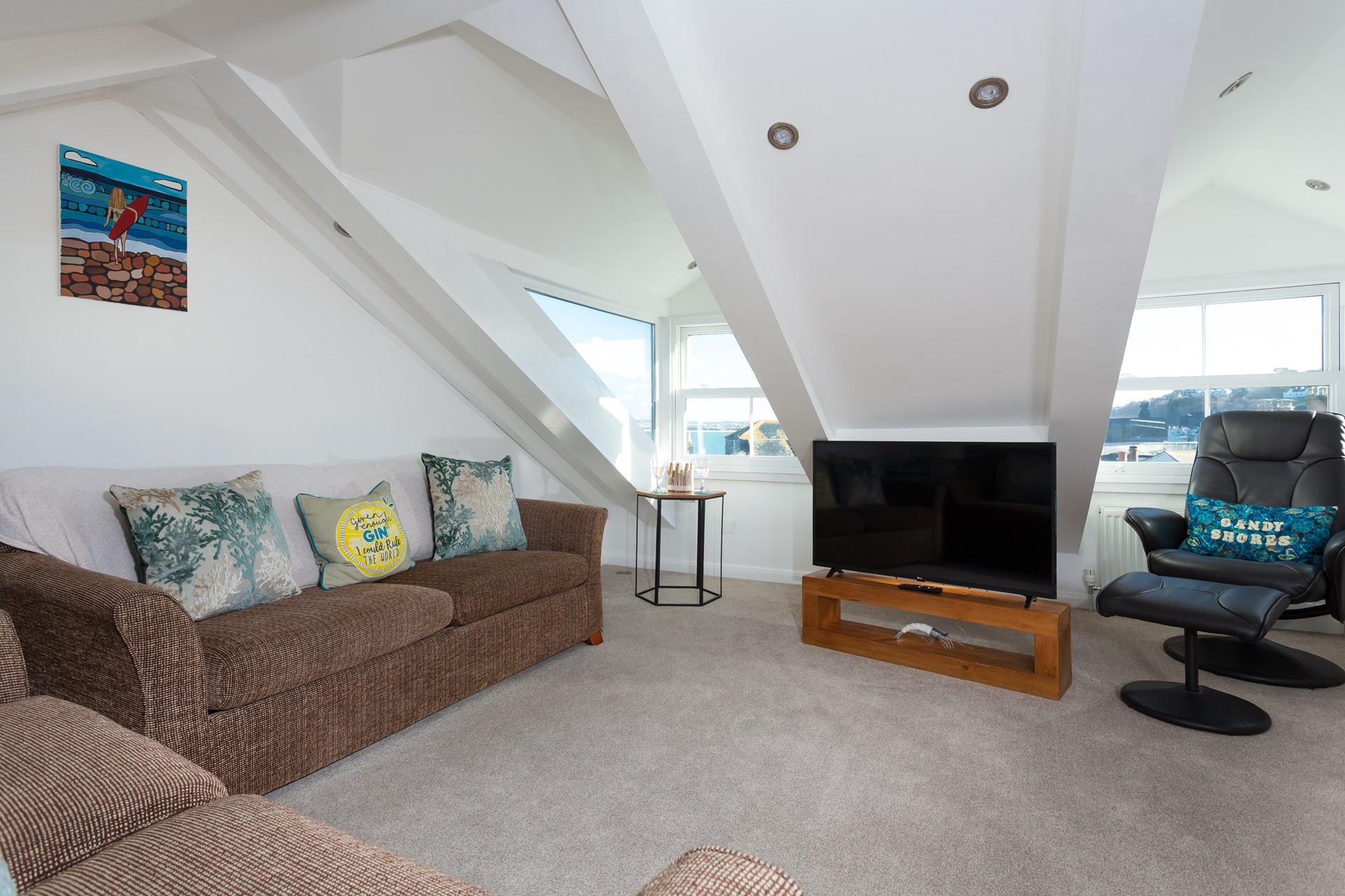 Sink into the sofa and put a good film on the TV.